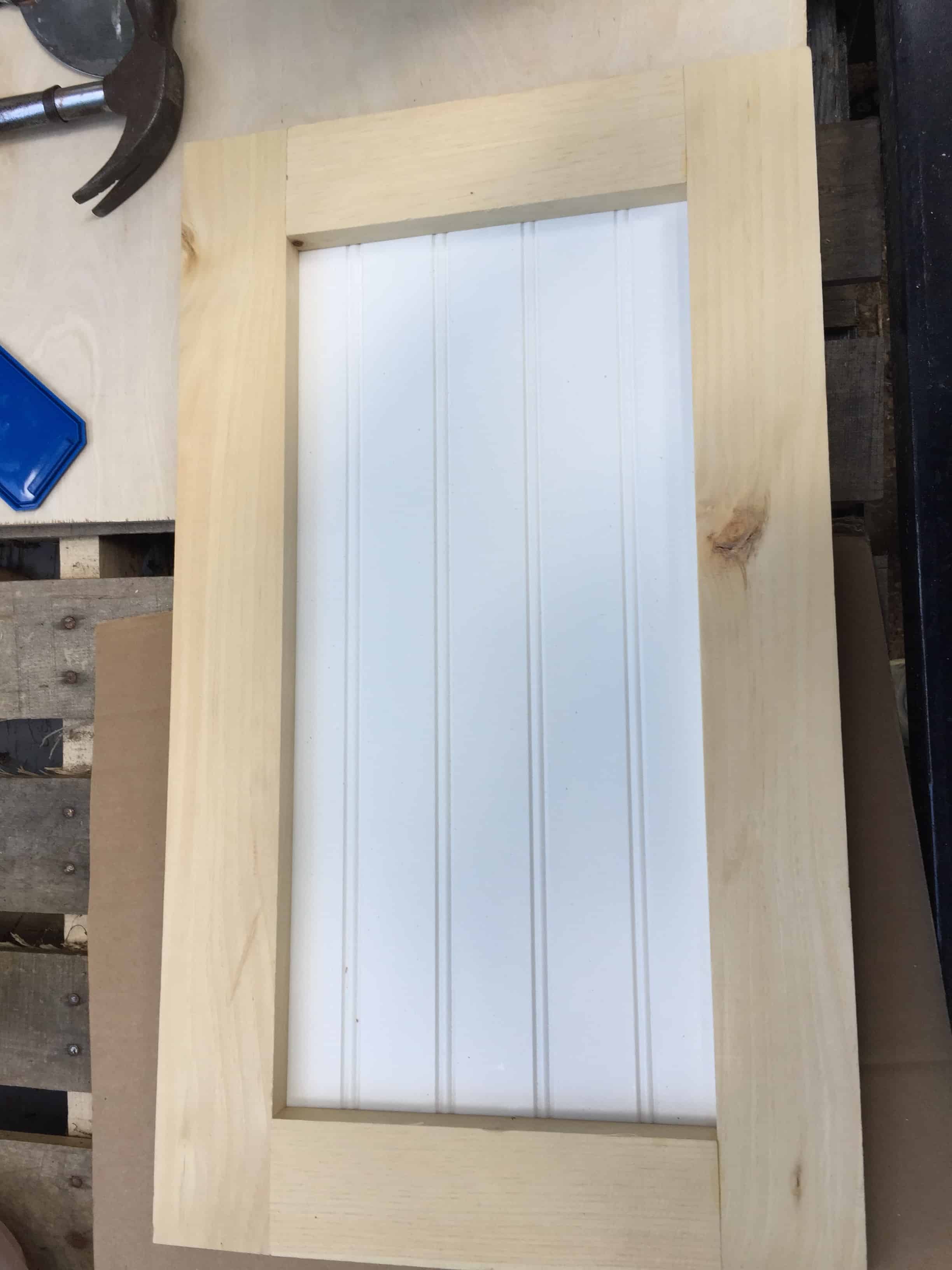 Saved by Scottie rv remodel storage cabinet build door before paint