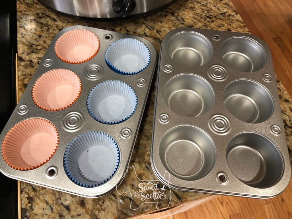 two muffin tins ready to start making diy firestarters one with paper cupcake liners and the other empty