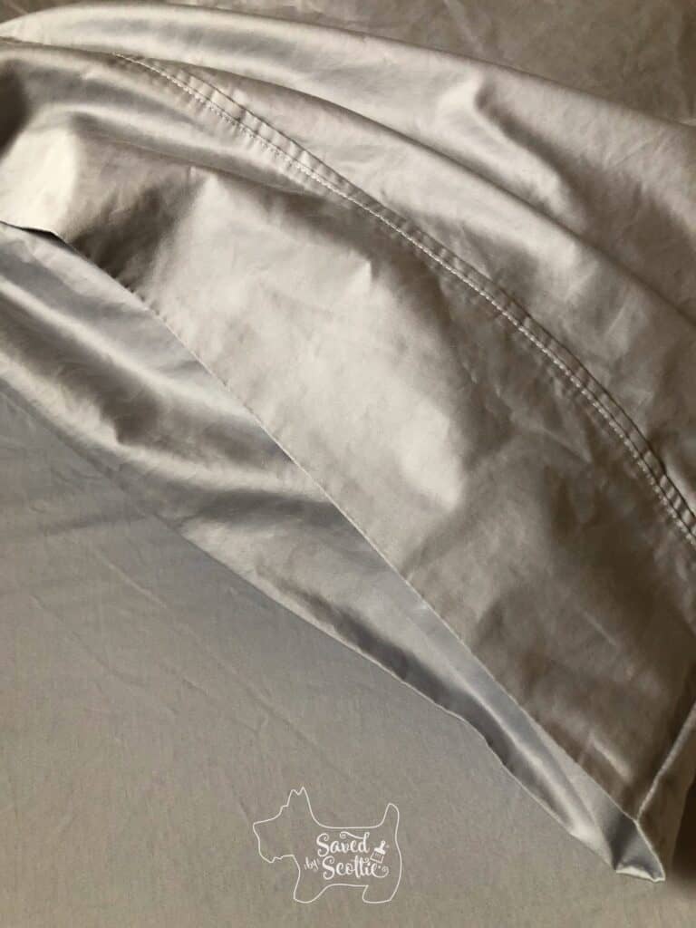 closed grey Therapedic sheets pillowcase with flap closure.