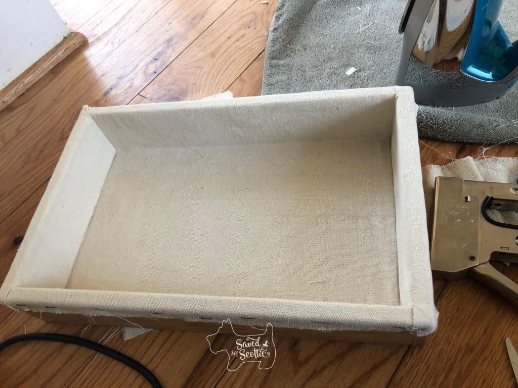 open compartment of lingerie chest after makeover with drop cloth